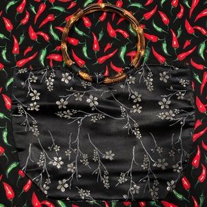 Black floral satin bag